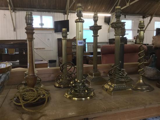 8 various brass & other column lamps